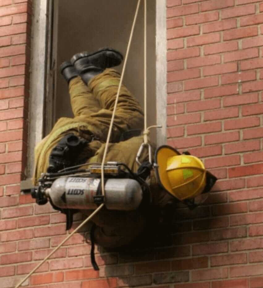 Firefighter going down the rope